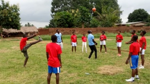 Campers and staff play sports at the youth camp in Togo. 