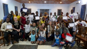 Campers receiving certificates for exemplary behavior and sportsmanship at camp.