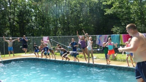 Campers cool off in the pool at camp Seven Mountains.