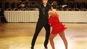 Alexander Schweitzer with his dance partner Tina Freitag, competing at the Wisconsin Dancesport Championship.