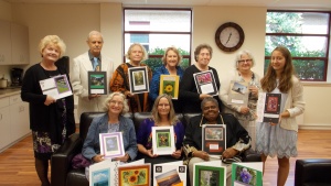 Members of the St. Louis, MO, congregation with their card projects. 