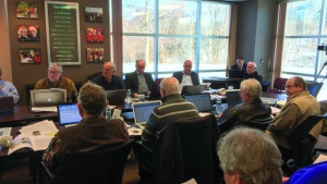 Members of the Council of Elders gather at the Home Office for their quarterly meeting. 