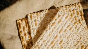 several matzos against a cloth backdrop