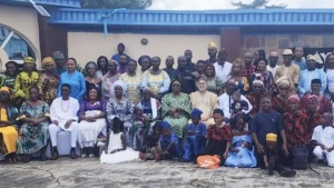 a large group of people standing outside a building