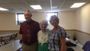 Macie May (in the middle) with her son Darrel and daughter-in-law. 