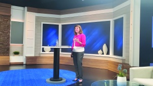 Photo of Julie Brown presenting an analysis of the results.