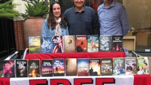 Jennifer Heesch, Mario Seiglie and Bill Carter at the newsstand at Irvine Spectrum Mall.