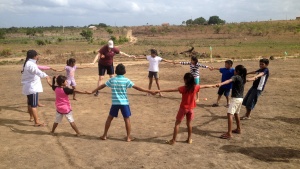 children holding hands playing games