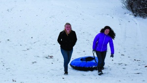 After a few inches of snowfall, campers and staff were able to go tubing and enjoy fellowship outside.