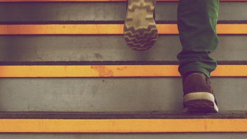 A person walking up stairs.