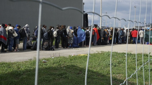 A line of Syrian refugees crossing the border of Hungary and Austria on their way to Germany.