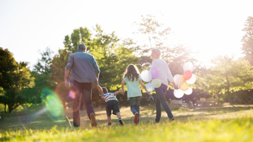 A family walking in a park.