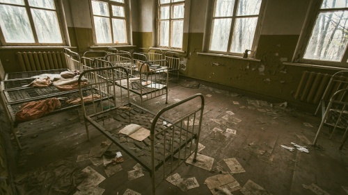 Metal frames of children's beds are all that are left in this abandoned room from the 1986 Chernobyl disaster.