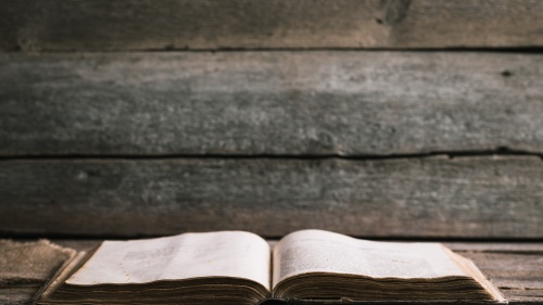 A Bible on a table.