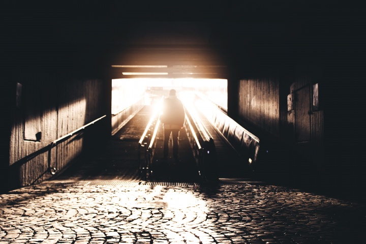 A man walking up stairs.