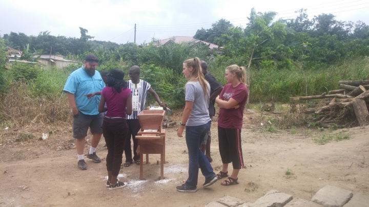 cassava mill and group of people