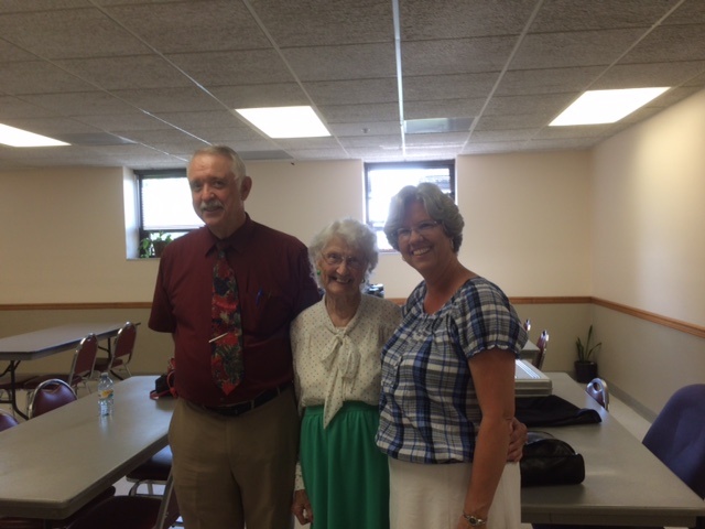 Macie May (in the middle) with her son Darrel and daughter-in-law. 